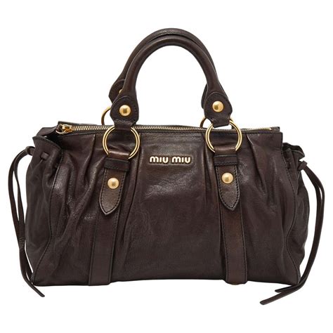 miu miu dark brown vitello lux leather bow tote|Miu Miu Dark Brown Vitello Lux Leather Bow Tote .